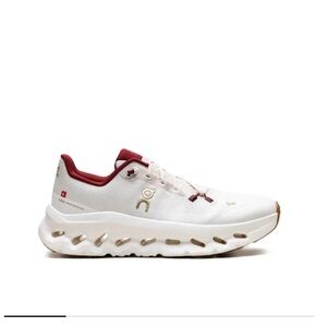 On Running White and Red Athletic Shoes